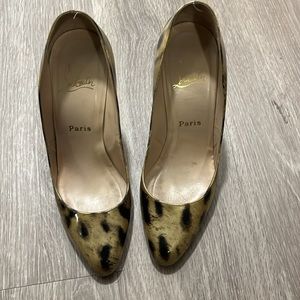 Barely worn leopard print round toe Dolly Pump Christian Louboutins